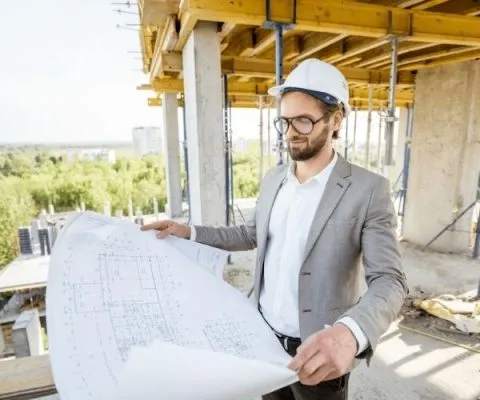 Town planner reviewing subdivision plans